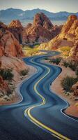 Scenic winding road through rocky desert landscape during golden hour photo