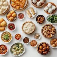 Variety of dim sum dishes arranged beautifully on a table for a delightful dining experience photo