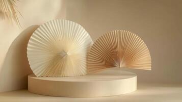 Elegant arrangement of three paper fans displayed on a round pedestal with a neutral background photo