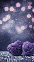 Purple yarn balls create a charming display against a soft bokeh background in evening light photo