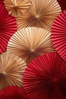Decorative fans in red and gold arranged in a beautiful display for a festive event photo