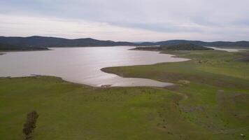 A large lake in Spain with hills in the background video