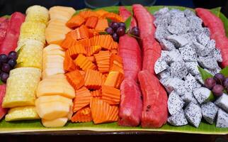 A set of chopped tropical fruit is ready to eat photo