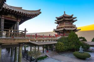 Dunhuang,China-OCT 21, 2024- Crescent Lake, called as Yueyaquan, is a crescent shaped lake in the oasis, located in Dunhuang city, China photo