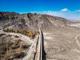 Aerial view of The Overhanging Great Wall, also recognized as the Xuanbi Great Wall, Jiayugyan city, Gansu , China photo