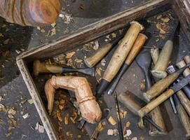 carpentry tools on a worksite, wood carving tools photo