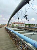 A bridge with a bunch of locks on it photo
