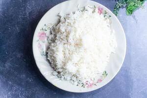 Plain Steamed Rice served in plate isolated on grey background top view of bangladeshi food photo