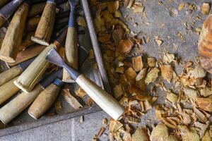 carpentry tools on a worksite, wood carving tools photo