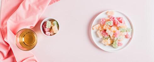 Freeze dried chewy candies on a plate on a table top view web banner photo