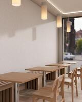 A minimalist and comfortable coffee shop features a row of minimalist wooden table and chair. photo