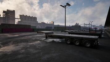 Parked Flatbed Trailer in Parking Lot photo