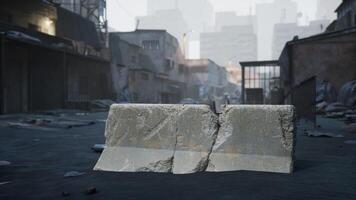 Urban scene with a cracked concrete block in a desolate alleyway at dusk photo
