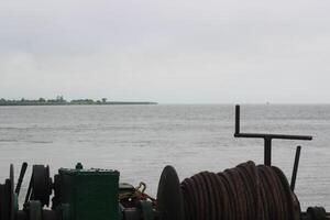 A sturdy ship rope coiled neatly photo