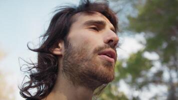 Long Haired Man Talks Suspiciously With Distrustful Passers-by in the Park video