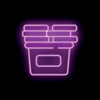 Neon sign of stack of clothes in laundry basket on black background vector
