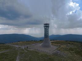 Observation tower on the peak of Mount Kralicky Sneznik, Eastern Sudetes on the border of Poland and the Czech Republic photo