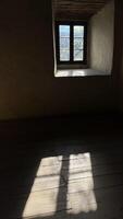 Sunlight from the window through the ancient windows in the castle, view from the inside. Poland photo