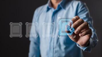 man touch screen to manage data,Document Management System DMS,knowledge and documentation in enterprise with ERP.online documentation database and process automation to efficiently manage files. photo