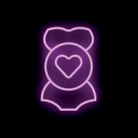 Neon pink heart quality badge glowing on black background vector