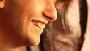Man Smiling Closeup Portrait Happiness - A close-up portrait of a man smiling, capturing the happiness on his face. video