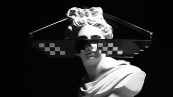 A statue with a checkered mask on it video
