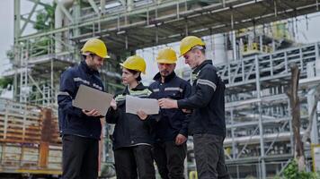 Group of workers teamwork Industry in oil refinery equipment Check and check the condition of the machinery system , Engineering concept. video