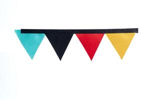 Colorful bunting paper flags isolated on a white background with clipping path photo