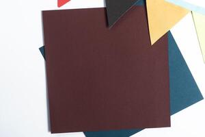 Colorful bunting party flags with blank paper card for custom message photo