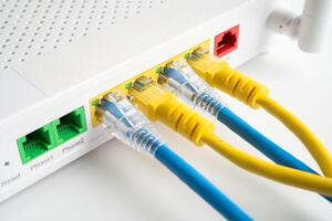 Ethernet cable with wireless router connect to internet service provider internet network. photo
