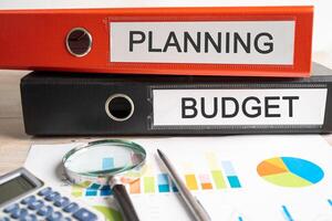 Payroll overtime. Binder data finance report business with graph analysis in office. photo