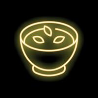 Neon sign of soup bowl with herbs glowing on black background vector