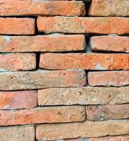 A brick wall with many different colors photo