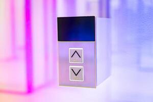 Elevator button on wall. Elevator Button up and down direction with copy space. photo