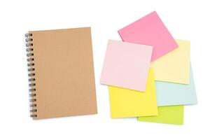 Top view of notebook. Blank paper notepad isolated on white background. Blank notebook page for input the text. copy space, flat lay. photo