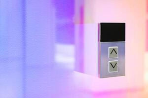 Elevator button on wall. Elevator Button up and down direction with copy space. photo