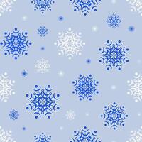 Snowflakes seamless pattern. Blue and white design elements on gray background. vector