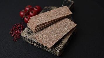 Rectangular whole grain crisp bread with cream cheese for a hearty, nutritious breakfast video