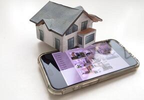 Controlling home heating temperature with a smart home, close-up on phone. Concept of a smart home and mobile application for managing smart devices at home photo