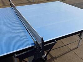 ping-pong table with a net photo