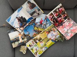 Close-up of craft paper photo album pages in lighting, highlighting the texture and depth of the paper. Perfect for showcasing handmade, artisanal designs with moody, elegant contrast.