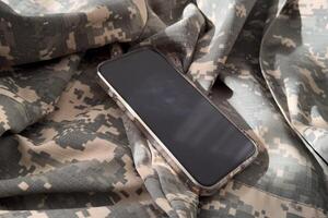 Mockup of a smartphone with a white screen on a dark concrete background. 3D rendering. photo