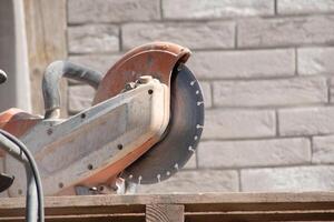 motion blur working concrete saw for sawing bricks of the right size, using technologies, High quality photo