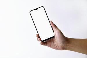 Male hand shows the screen of a mobile smartphone which has a white screen photo