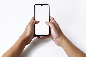 Someones hand is pressing and pointing at the screen of a smartphone photo