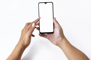 Someones hand is pressing and pointing at the screen of a smartphone photo