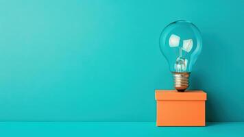 Creative light bulb on a colorful background. photo