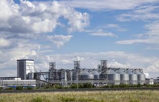 Large grain storage complex. Industrial area for sorting and storing grain. photo