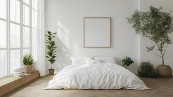 A white bedroom with a bed, a window and a potted plant photo