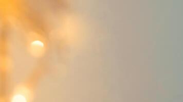 Golden bokeh festive lights with a soft, warm glow creating a cheerful atmosphere photo